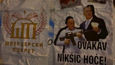 НИКШИЋ ОБЛЕПЉЕН ПЛАКАТИМА: Дака Давидовић у рукама држи снајпер, а поред њега Мило Ђукановић (ФОТО) НИКШИЋ ОБЛЕПЉЕН ПЛАКАТИМА: Дака Давидовић у рукама држи снајпер, а поред њега Мило Ђукановић (ФОТО)