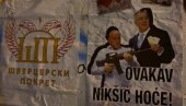 НИКШИЋ ОБЛЕПЉЕН ПЛАКАТИМА: Дака Давидовић у рукама држи снајпер, а поред њега Мило Ђукановић (ФОТО)