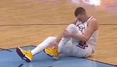JOKIĆ ZABRINUO NAVIJAČE: Nikola pao na parket i uhvatio se za nogu (VIDEO) JOKIĆ ZABRINUO NAVIJAČE: Nikola pao na parket i uhvatio se za nogu (VIDEO)