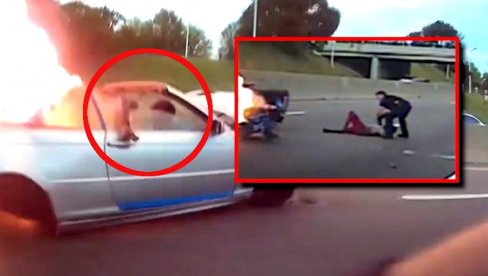 SCENA OD KOJE ZASTAJE DAH: Policajac iz automobila-buktinje izvukao čoveka bez svesti, postao heroj nacije (VIDEO) SCENA OD KOJE ZASTAJE DAH: Policajac iz automobila-buktinje izvukao čoveka bez svesti, postao heroj nacije (VIDEO)