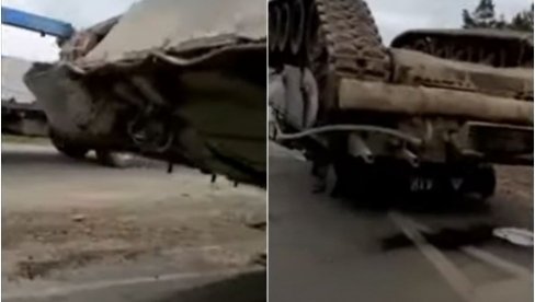 TENK SE PREVRNUO NA PUTU: Nesvakidašnja scena na Dalekom istoku Rusije (VIDEO) TENK SE PREVRNUO NA PUTU: Nesvakidašnja scena na Dalekom istoku Rusije (VIDEO)