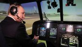 ПУТИН У КОКПИТУ ХЕЛИКОПТЕРА: Руски председник испробао симулатор летења Ми-171А2 ПУТИН У КОКПИТУ ХЕЛИКОПТЕРА: Руски председник испробао симулатор летења Ми-171А2