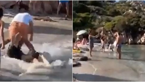 CIRKUS NA ITALIJANSKOJ PLAŽI: Branio suprugu nindža potezom, snimak tuče postao hit (VIDEO) CIRKUS NA ITALIJANSKOJ PLAŽI: Branio suprugu nindža potezom, snimak tuče postao hit (VIDEO)