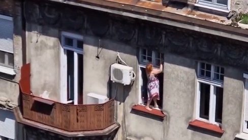 BEOGRAĐANI U ČUDU: Žena odlučila da opere prozore, pa ostavila sugrađane bez teksta (VIDEO) BEOGRAĐANI U ČUDU: Žena odlučila da opere prozore, pa ostavila sugrađane bez teksta (VIDEO)