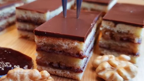ŽERBO KOCKE: Kolač sa pekmezom, orasima i čokoladom omiljeni je desert na slavama širom Srbije ŽERBO KOCKE: Kolač sa pekmezom, orasima i čokoladom omiljeni je desert na slavama širom Srbije
