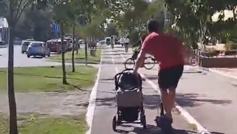 MOZAK, ŠTA TO BEŠE? Snimak muškarca iz Novog Sada zgrozio javnost - vozi trotinet i gura bebu u kolicima (VIDEO) MOZAK, ŠTA TO BEŠE? Snimak muškarca iz Novog Sada zgrozio javnost - vozi trotinet i gura bebu u kolicima (VIDEO)