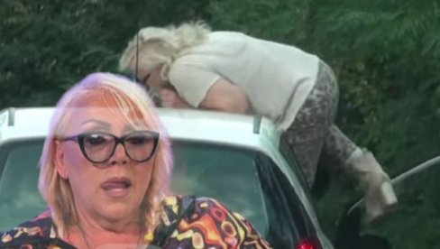 IZAZVALA KOLAPS U SAOBRAĆAJU: Zorica se popela na krov auta (FOTO) IZAZVALA KOLAPS U SAOBRAĆAJU: Zorica se popela na krov auta (FOTO)