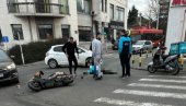 OBOREN DOSTAVLJAČ NA MOTORU: Leži nepomično na zemlji, uviđaj u toku OBOREN DOSTAVLJAČ NA MOTORU: Leži nepomično na zemlji, uviđaj u toku