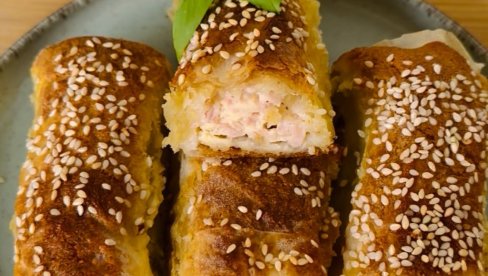 SAVRŠEN SPOJ TRADICIJE I UŽITKA: Pita sa sirom i šunkom (VIDEO) SAVRŠEN SPOJ TRADICIJE I UŽITKA: Pita sa sirom i šunkom (VIDEO)
