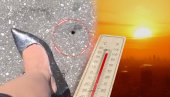 VREO SNIMAK IZ SRBIJE: Ženi štikla propala u asfalt (VIDEO)