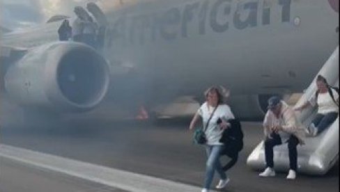 АВИОН ЈЕ У ПЛАМЕНУ Дим куља на све стране, путници падали по писти док су бежали (ВИДЕО)
