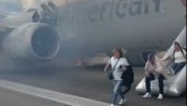 АВИОН ЈЕ У ПЛАМЕНУ Дим куља на све стране, путници падали по писти док су бежали (ВИДЕО)