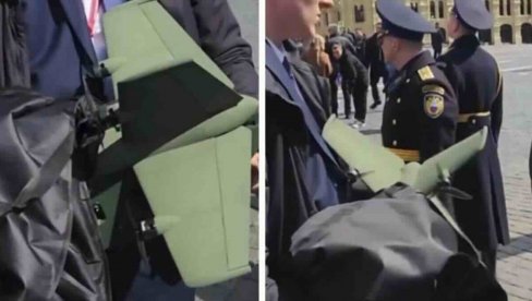 PUTIN IMA NOVO ORUŽJE! Prvi telohranitelj ruskog predsednika snimljen kako nosi misteriozno futurističko oružje (VIDEO)