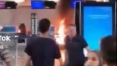 POGLEDAJTE NEVIĐEN HAOS NA AERODROMU U MILANU! Muškarac zapalio šalter, počeo sve da lomi čekićem, putnici u potpunoj panici beže