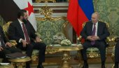БИВШИ ВОЂА ЏИХАДИСТА СЕ ДОДВОРАВА ПУТИНУ: Погледајте како нови лидер Сирије прича пред руским вођом (ВИДЕО)