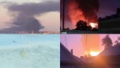 РУСИЈА ПОД УДАРОМ, ШИРЕ СЕ СНИМЦИ: Експлозије и дим код Санкт Петербурга, дронови прете Москви, алармантно стање (ФОТО/ВИДЕО)