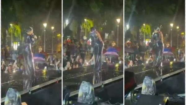 ПЉУСАК НИЈЕ МОГАО ДА ЈЕ ЗАУСТАВИ: Тања Савић певала на киши, није хтела да прекине концерт (ФОТО)