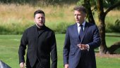 IMAŠ LI ZAKAZAN SASTANAK SA TRAMPOM? Kamere snimile tajni razgovor Zelenskog i Makrona na samitu G7 (VIDEO)